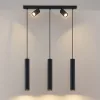 Modern Silindir Sarkıt Avize Modelleri Siyah Metal Kasa Yönlendirilebilir Spot Detaylı Çoklu Set Villa Yemek Masası ve Mutfak Adası Aydınlatma İmalatı Avize Aplik Dış Mekan Aydınlatma Modelleri İmalatı modern silindir sarkıt avize aydınlatma imalatı